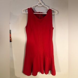 Red fitted dress.
